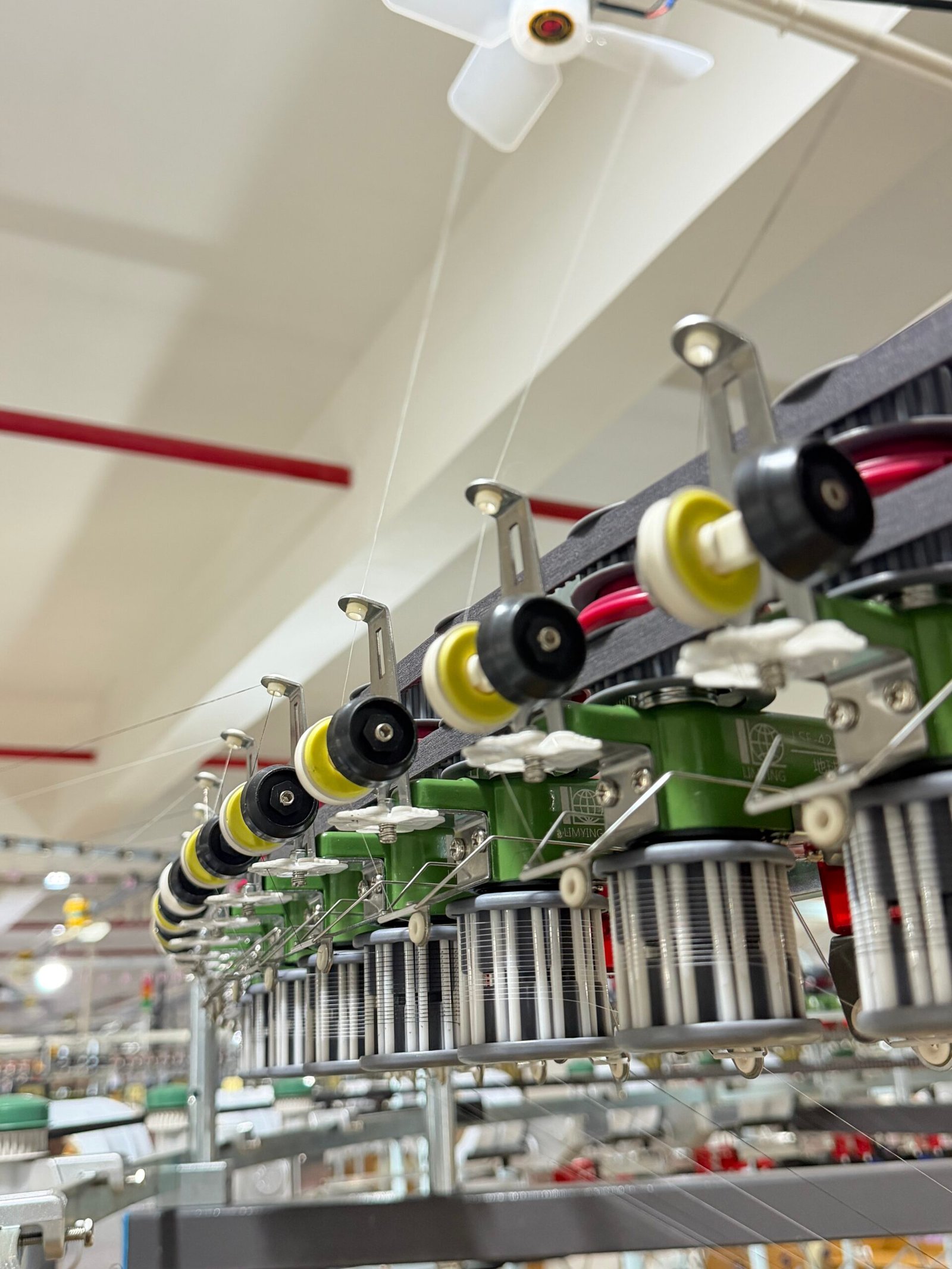 Circular knitting machine producing performance knit fabric